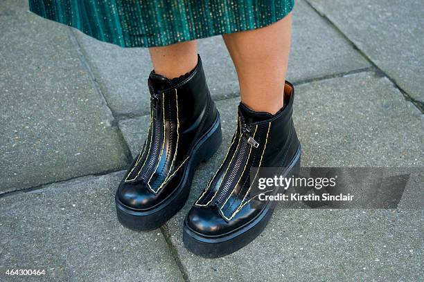 Jewellery and clothing designer Natasha Zinko wears a Tom Browney coat, Hermes bag on February 23, 2015 in London, England.