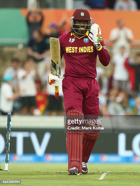 Chris Gayle of West Indies celebrates his double century during the 2015 ICC Cricket World Cup match between the West Indies and Zimbabwe at Manuka...