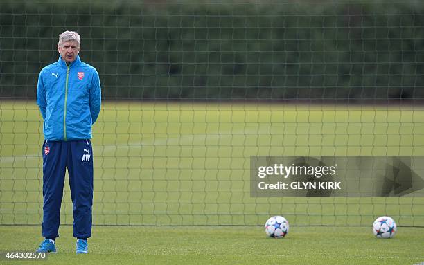 Arsenal's French manager Arsene Wenger attends a training session at Arsenal's training ground in London Colney, north of London, England on February...