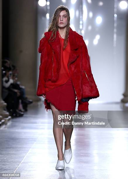 Model walks the runway at the Marques'Almeida show during London Fashion Week Fall/Winter 2015/16 at TopShop Show Space on February 24, 2015 in...