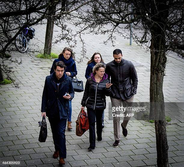 Former K-1 heavyweight kick-boxing champion Badr Hari arrives at the Amsterdam courtroom on 22 January 2014. Hari faces several criminal charges,...