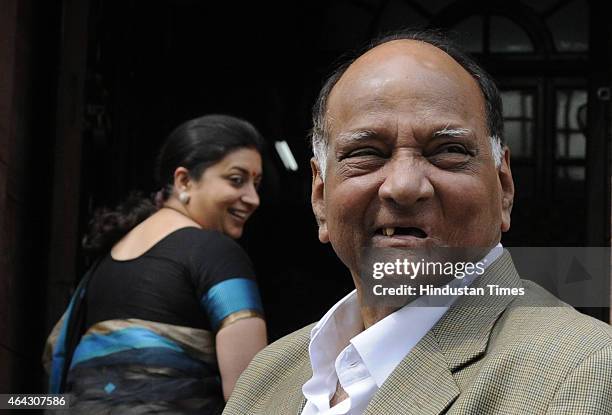 Chief Sharad Pawar and HRD Minister Smiriti Irani during Budget session at Parliament house on February 24, 2015 in New Delhi, India. The government...