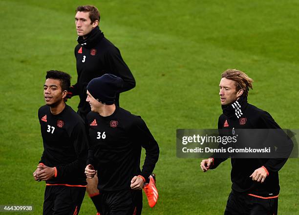 Bayer Leverkusen players practice during a training session ahead of their UEFA Champions League Round of 16 first leg match against Atletico Madrid...
