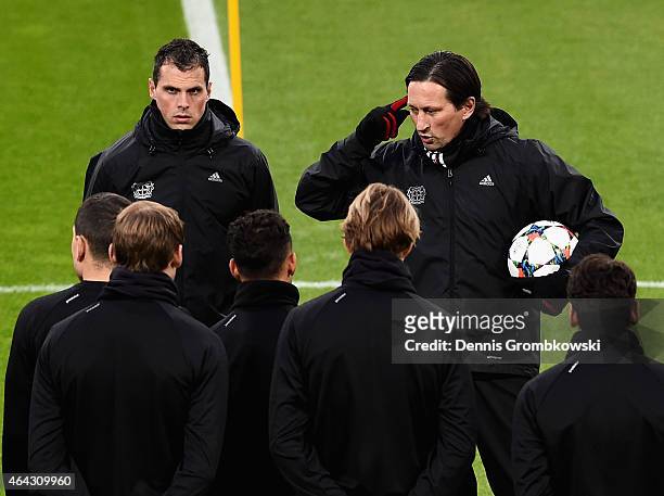 Head coach Roger Schmidt of Bayer Leverkusen reacts during a training session ahead of their UEFA Champions League Round of 16 first leg match...
