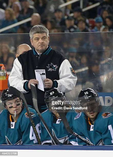 Head coach Todd McLellan of the San Jose Sharks watches his team play in the 2015 Coors Light NHL Stadium Series game against the Los Angeles Kings...