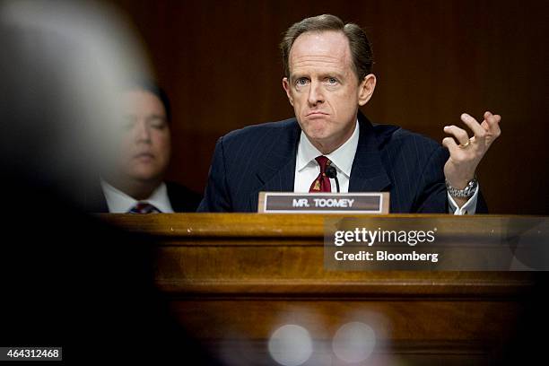 Senator Patrick "Pat" Toomey, a Republican from Pennsylvania, questions Janet Yellen, chair of the U.S. Federal Reserve, left, during a Senate...