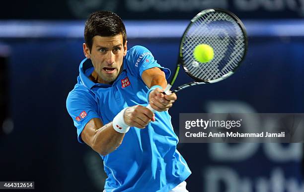 Novak Djokovic of Serbia in action against Vasek Pospisil of Canada during day two of the ATP Dubai Duty Free Tennis Championships at the Dubai Duty...