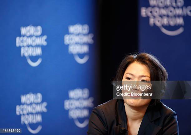 Zhang Xin, chief executive officer of Soho China Ltd., pauses during a session on the opening day of the World Economic Forum in Davos, Switzerland,...