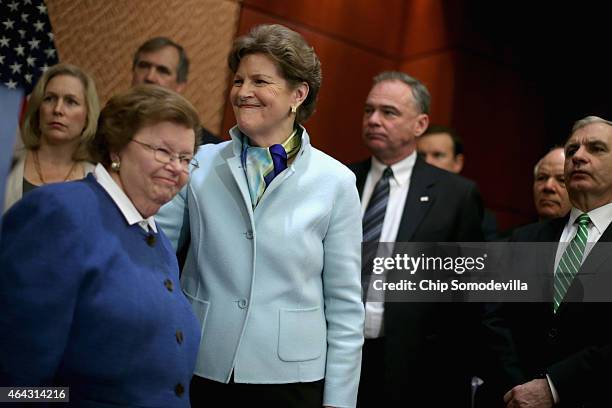 Joined by fellow Senate Democrats, Appropriations Committee ranking member Sen. Barbara Mikulski and Sen. Jeanne Shaheen put their arms around each...