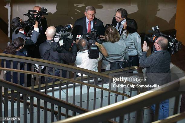 Senate Foreign Relations Committee ranking member Sen. Robert Menendez talks with reporters after a news conference about the possible shutdown of...