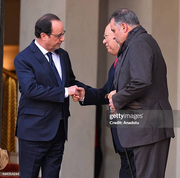 Paris Mosque rector Dalil Boubakeur shake hands with French President Francois Hollande at the Elysee Palace in Paris, France, 24 February 2015.