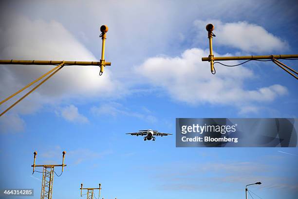 An Avro RJ85 passenger aircraft, operated by CityJet Ltd., a unit of Air France-KLM Group, comes in to land at London City Airport in London, U.K.,...