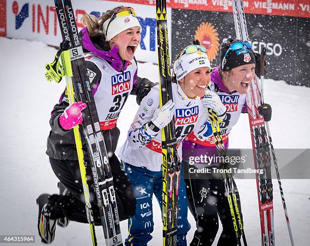 Charlotte Kalla of Sweden celebrates winning the gold medal with Jessica Diggins of USA and Caitlin Gregg of USA at the Ladies 10.0 km Individual...