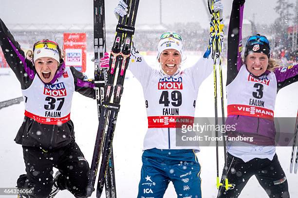 Charlotte Kalla of Sweden celebrates winning the gold medal with Jessica Diggins of USA and Caitlin Gregg of USA at the Ladies 10.0 km Individual...