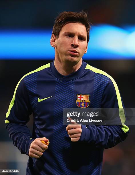 Lionel Messi of Barcelona warms up during the UEFA Champions League Round of 16 match between Manchester City and Barcelona at Etihad Stadium on...