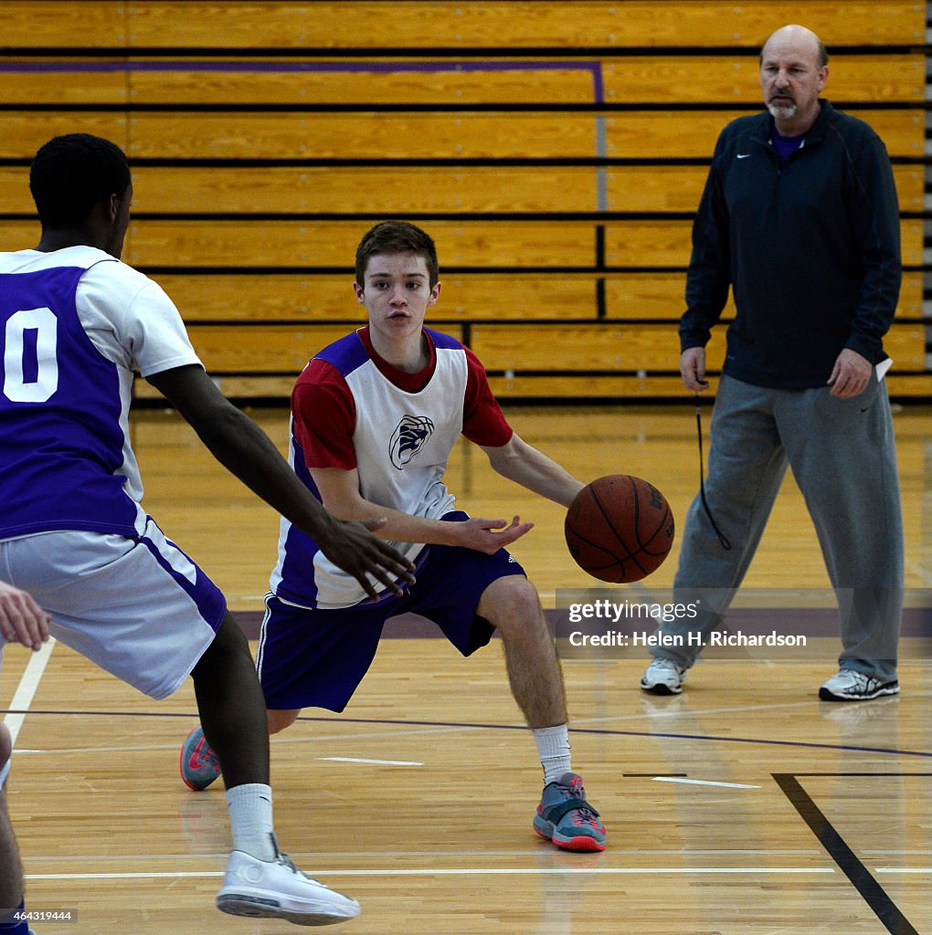 Brothers Thomas and Luke Neff practice at Arvada West high school in Arvada, Colorado.