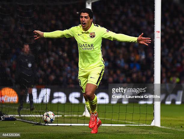 Luis Suarez of Barcelona celebrates scoring their second goal during the UEFA Champions League Round of 16 match between Manchester City and...