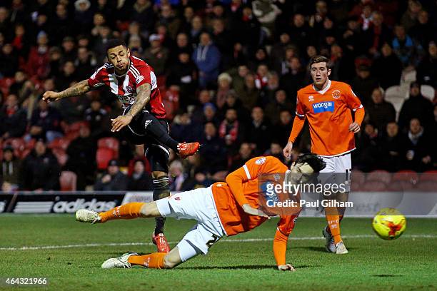 Andre Gray of Brentford scores his team's third goal during the Sky Bet Championship match between Brentford and Blackpool at Griffin Park on...