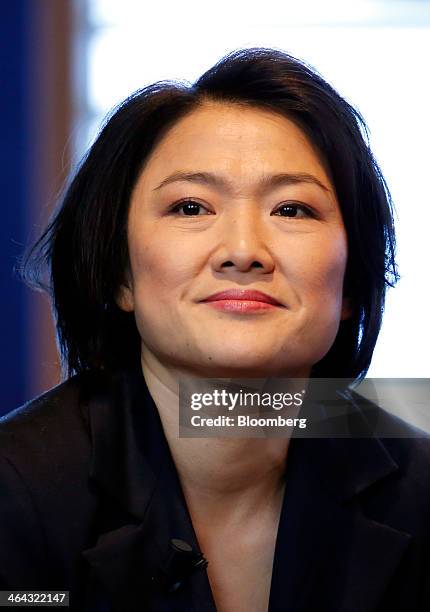 Zhang Xin, billionaire and chief executive officer of Soho China Ltd., reacts during a session on the opening day of the World Economic Forum in...