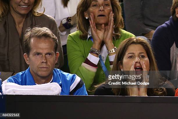 Stefan Edberg, coach, and Mirka Federer, wife of Roger Federer of Switzerland watches him in his quarterfinal match against Andy Murray of Great...