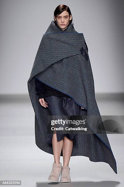 Model walks the runway at the Christopher Raeburn Autumn Winter 2015 fashion show during London Fashion Week on February 24, 2015 in London, United...