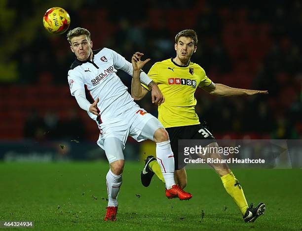 Danny Ward of Rotherham United battles for the ball with Tommie Hoban of Watford during the Sky Bet Championship match between Watford and Rotherham...