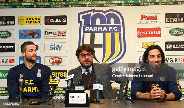 Jonathan Rossini, General Manager for Parma FC Pietro Leonardi and Ezequiel Schelotto are presented as new signings for Parma FC during a press...