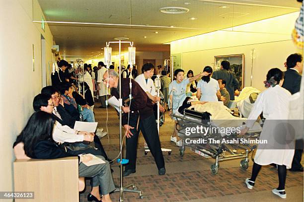 Corridor of the St. Luke's International Hospital is packed with victims of the sarin gas attack, doctors and nurses on March 20, 1995 in Tokyo,...