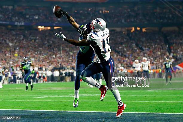 Brandon LaFell of the New England Patriots fails to complete the catch against Tharold Simon of the Seattle Seahawks in the fourth quarter during...