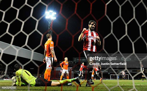 Jonathon Douglas of Brentford FC celebrates Brentfords 3rd goal scored by Andre Gray of Brentford FC during the Sky Bet Championship match between...