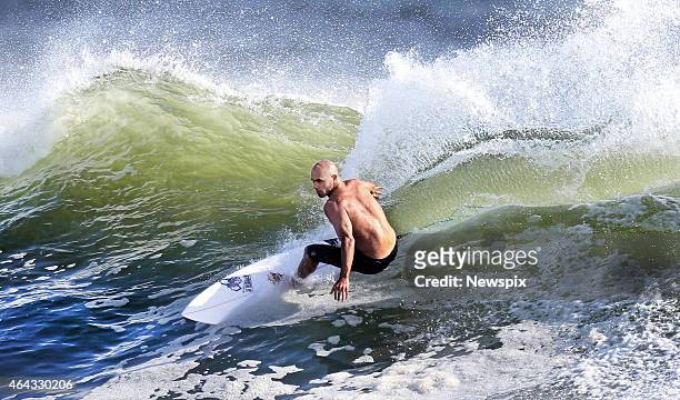 American surfer Kelly Slater hits the waves at Snapper Rocks in preparation for the Quiksilver Pro on the Gold Coast, Australia.