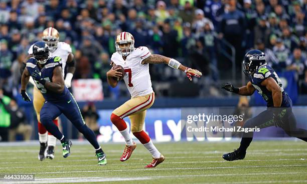 Colin Kaepernick of the San Francisco 49ers rushes for a 58-yard gain during the game against the Seattle Seahawks at CenturyLink Field on January...