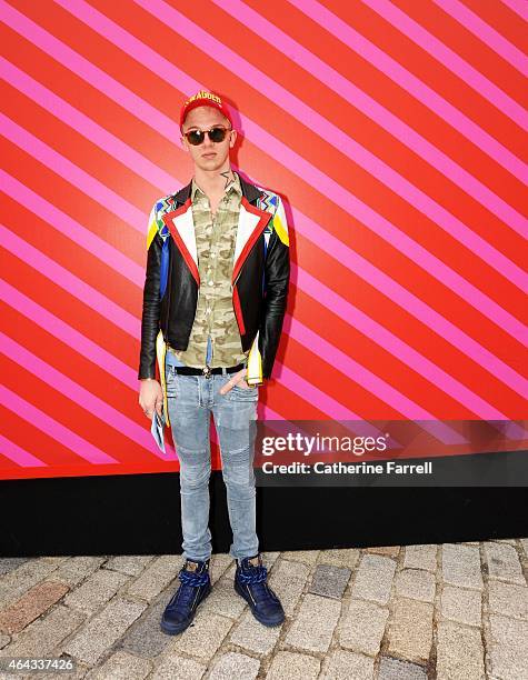 Chris Koch,fashion design student at Marangoni school of fashion London wearing a Christophe Terzian jacket, and Balmain jeans, accessorised with a D...