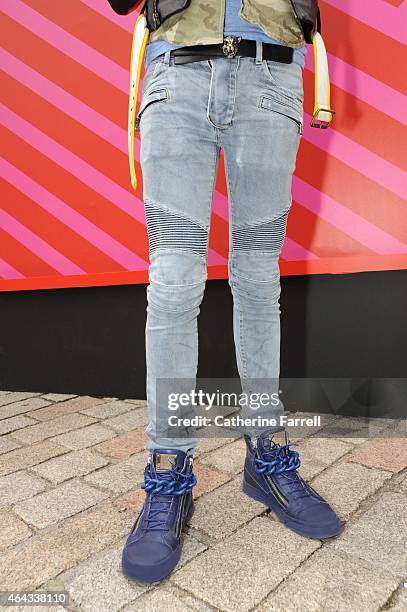 Chris Koch, fashion design student at Marangoni college of fashion, London wearing Balmain jeans accessorised with D Squared boots during London...