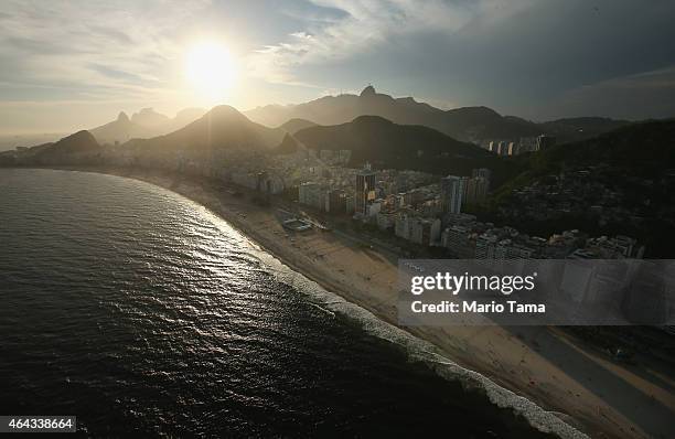 The sun begins to set over Copacabana beach, which will host beach volleyball, open water marathon and triathlon for the Rio 2016 Olympic Games, on...