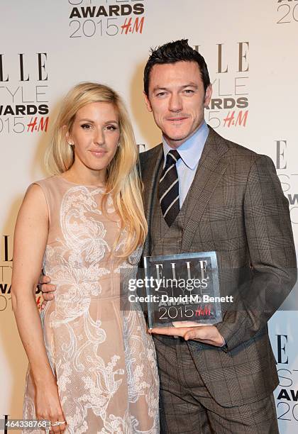 Presenter Ellie Goulding and Luke Evans, winner of the Actor of the Year award, pose in the Winners Room at the Elle Style Awards 2015 at Sky Garden...