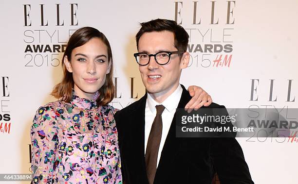 Alexa Chung and Erdem Moralioglu, winner of the Designer of the Year award, pose in the Winners Room at the Elle Style Awards 2015 at Sky Garden @...