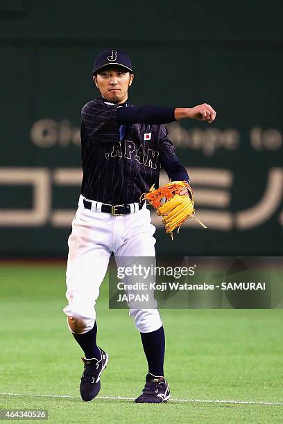 Ryosuke Kikuchi of Samurai Japan throws during the game two of Samurai Japan and MLB All Stars at Tokyo Dome on November 14, 2014 in Tokyo, Japan.