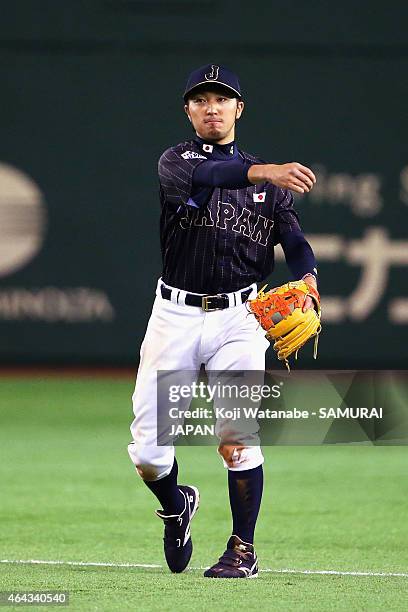 Ryosuke Kikuchi of Samurai Japan throws during the game two of Samurai Japan and MLB All Stars at Tokyo Dome on November 14, 2014 in Tokyo, Japan.