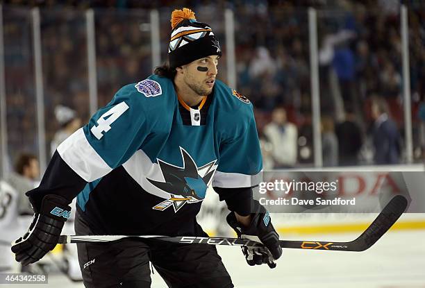 Brenden Dillon of the San Jose Sharks warms up before playing against the Los Angeles Kings during the 2015 Coors Light NHL Stadium Series game at...