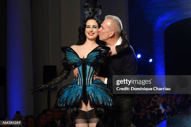 Designer Jean Paul Gaultier kisses Dita Von Teese on the runway for Jean Paul Gaultier show finale as part of Paris Fashion Week Haute Couture...