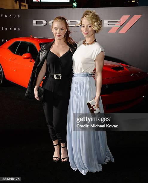 Actresses Kelli Garner and Karine Vanasse attend the Los Angeles Premiere of "Focus" Sponsored By Dodge at TCL Chinese Theatre on February 24, 2015...