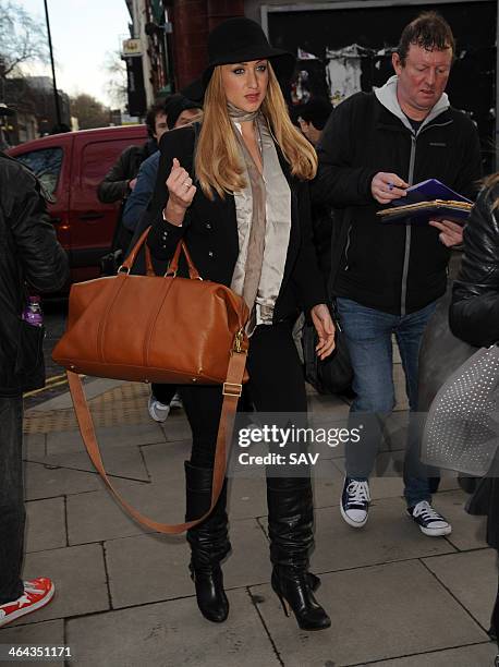 Catherine Tyldesley arrives at Euston for the television awards on January 22, 2014 in London, England.