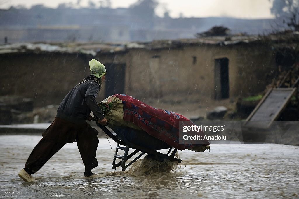 Afghan refugees live in harsh conditions after heavy rain in Pakistan