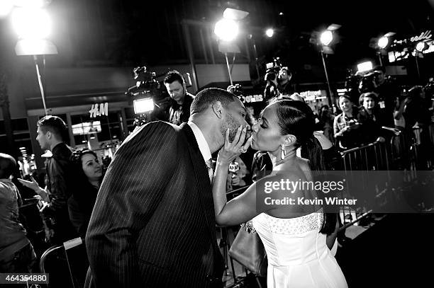 Actors Will Smith and his wife Jada Pinkett Smith arrive at the premiere of Warner Bros. Pictures' "Focus" at the Chinese Theatre on February 24,...