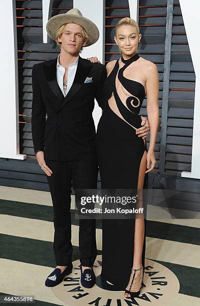 Singer Cody Simpson and model Gigi Hadid arrive at the 2015 Vanity Fair Oscar Party Hosted By Graydon Carter at Wallis Annenberg Center for the...