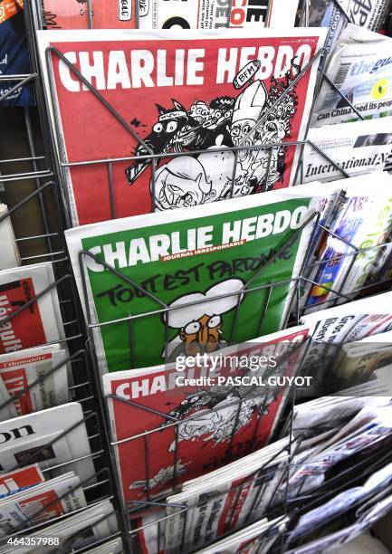 The latest edition of French satirical weekly newspaper Charlie Hebdo is on display at a newstand on February 25, 2015 in Montpellier. More than a...