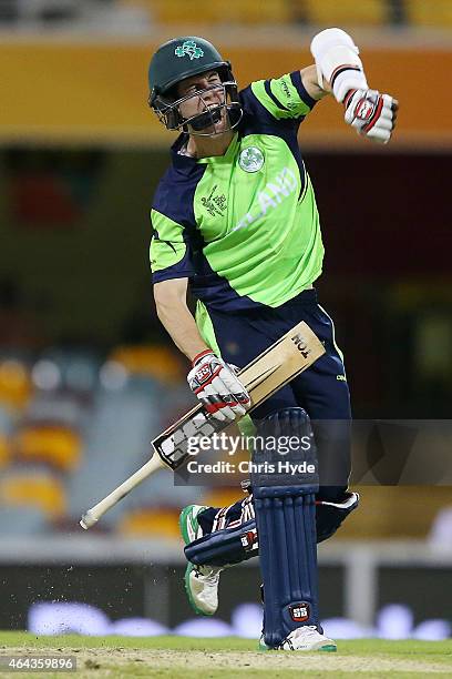 George Dockrell of Ireland celebrates winning the 2015 ICC Cricket World Cup match between Ireland and the United Arab Emirates at The Gabba on...