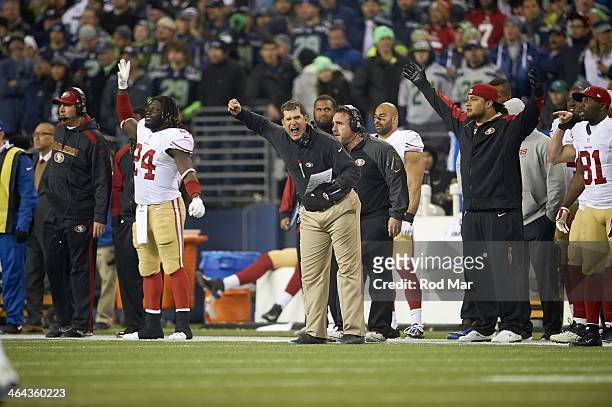 Playoffs: San Francisco 49ers head coach Jim Harbaugh upset on sidelines during game vs Seattle Seahawks at CenturyLink Field. Seattle, WA 1/19/2014...