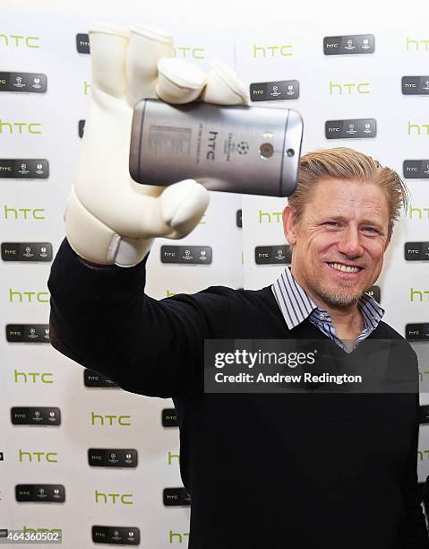 International goalkeeper Peter Schmeichel launches HTC's UEFA Collectors Edition 'Champions' handset at Carphone Warehouse on February 24, 2015 in...